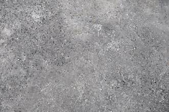 Rural road pavement dark rough asphalt concrete. Seamless flat background texture top view