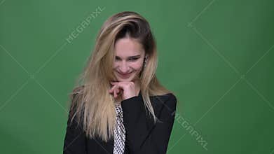 Closeup shoot of young attractive hipster caucasian female being shy and cute smiling happily looking straight at camera