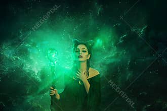 Mysterious dark elf got terrible curse, charming girl with horns on head and glowing sparkling magic stick in hands