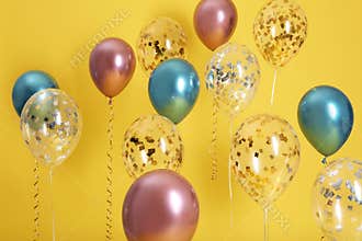 Bright balloons with ribbons