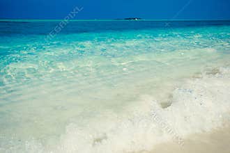 Exotic tropical beach. Summer vacation and tourism, popular destination, luxury travel concept. Maldives, Indian Ocean. Seascape w