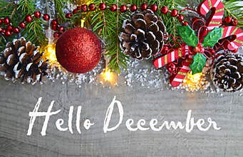 Hello December.Christmas decoration on old wooden background.Winter holidays concept.