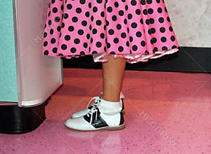 Pink poodle skirt and saddle shoes