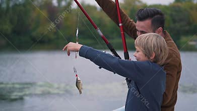 Father with son are fishing