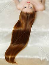 The beautiful girl with long red hair