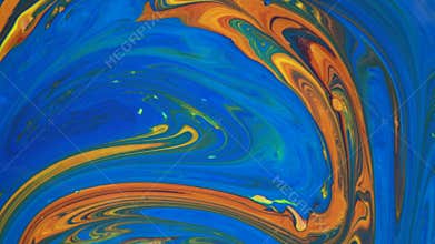 4K footage. Ink in water. Blue and orange ink reacting in water creating abstract background.