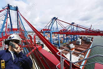 Engineer, containers and cranes