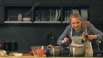Woman cooking in the kitchen
