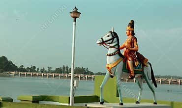 The king raja raja chola statue in the Grand old dam of Kallanai constructed by king karikala chola with granite stone.