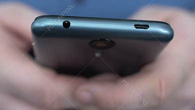 Man searching information online smartphone closeup, internet order, technology