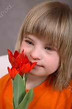 Pretty Girl with Red Tulips