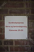school nurse sign on school building