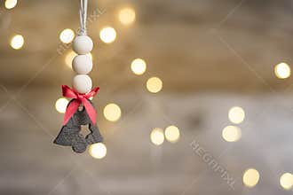 Background with ornament in shape of bell for Christmas mood.