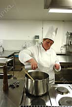Chef cooking in kitchen