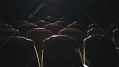 Empty comfortable seats in the cinema. Empty seats in the cinema. The cinema hall is ready for visitors. Right to left.
