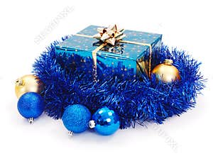Blue Christmas gift surrounded with blue garland