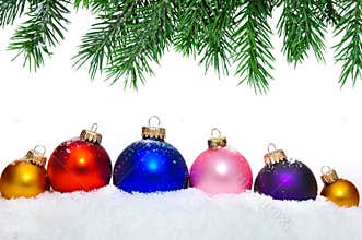 Close up of decorative Christmas balls and tree.