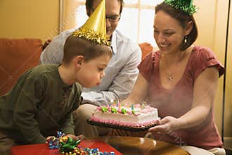 Boy with birthday cake.