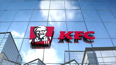 Editorial KFC logo on glass building.