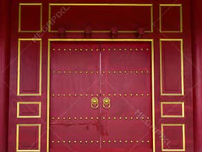Blood-red wooden door