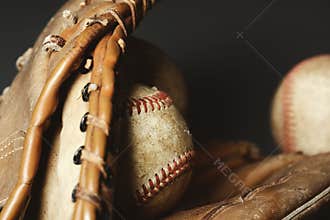 Baseball old ball in glove
