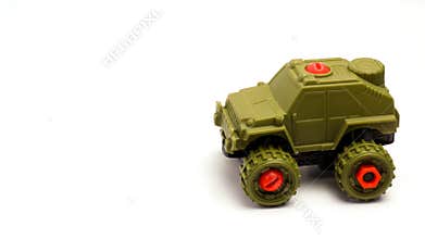 Children\'s Toy In The Shape Of A Military Jeep With White Background