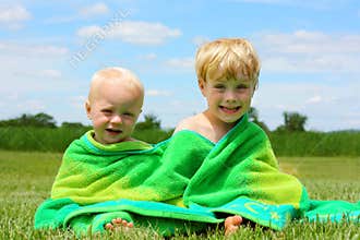 Brothers Wrapped in Beach Towel