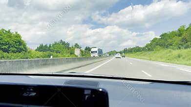 Niederentzen, France - June 6 2024 : Driving on Highway with Waze Navigation Displayed on Apple CarPlay in a Modern Car