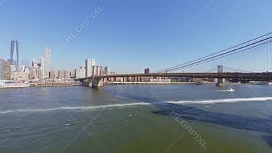 East River with Brooklyn Bridge and Manhattan