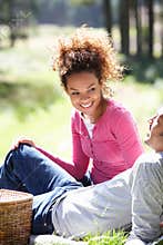 Couple Having Picnic In Countryside