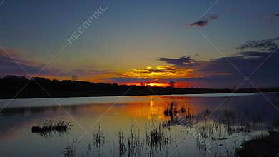 sunset over lake, panorama timelapse
