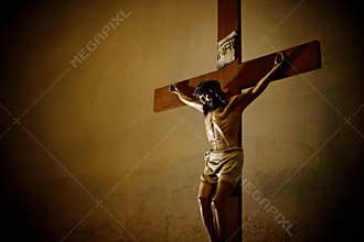 Catholic church and Jesus Christ on crucifix