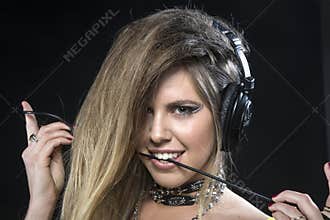 Blonde woman wearing headphones