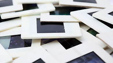 bunch of slides in white framed rotates clockwise,