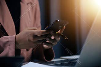 Work using mobile phone typing computer mobile chat laptop contact us at workplaces, planning ideas investors internet searching,