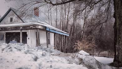 Boston wintery scene in Massachusetts. Abandoned house.