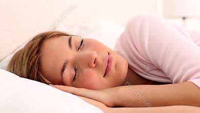 Blonde woman enjoying her sleep