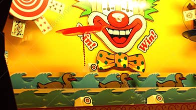 Duck shooting at carnival booth