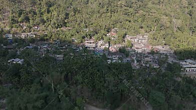 Aerial view of Shnongpdeng village built on a steep, jungle-covered mountainside in the gorges of Meghalaya, India