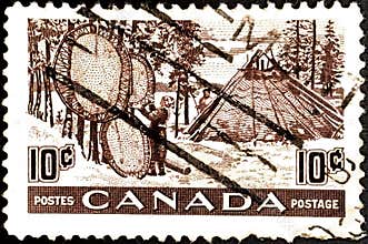 stamp printed in the Canada shows Indians Drying Skins on Stretchers, Fur Resources, circa 1950