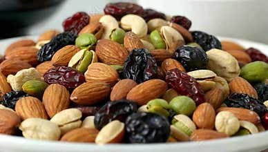Assorted nuts and dried fruits create a healthy snack mix perfect for boosting energy and providing essential nutrients
