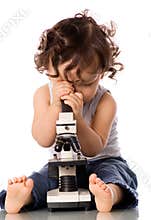 Baby with microscope.