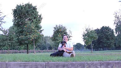 Man embrace the dog