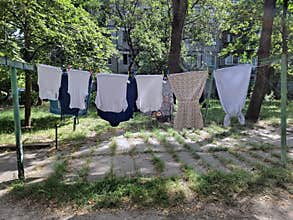 Laundry drying in the open air near the house