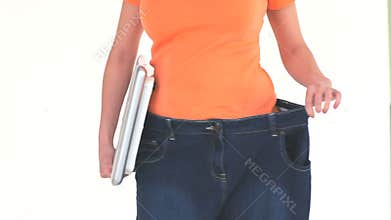 Woman happy to have lost weight