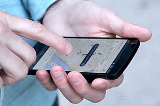 Man using Uber Mobile App