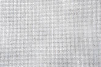 Fabric canvas for cross stitch crafts. Texture of cotton fabric