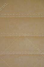 Alcantara leather. Beige background with white thread