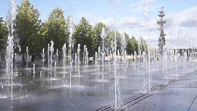 Fountain in Muzeon Park on Krymskaya Naberezhnaya in central Moscow. In the background monument to Peter the Great - first Russian