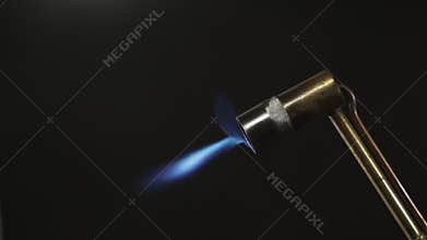 Detailed overview of jeweler metal melting and soldering system with blowtorch